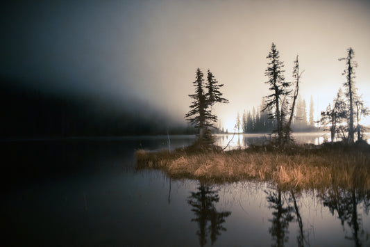 Sunrise in the mist of Bridal lake